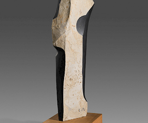 Isamu Noguchi (Los Angeles, California, 1904 - 1998, New York, New York), "Untitled," 1980 - 1981, basalt on wood base, 19 3/4 x 5 3/4 x 5 in., Arkansas Museum of Fine Arts Foundation Collection: Gift of John and Robyn Horn. Photography by Edward C. Robison III.