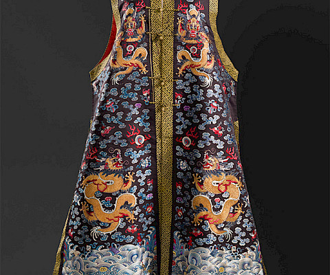 Unknown, "Chinese Embroidered Long Vest," 1644 - 1911, silk gold thread, and metal enclosures, length: 56 in. On loan from the collection of Maria Nevelson. Photography by Edward C. Robison III.