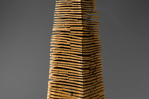 Detail photo of an abstract wooden sculpture.